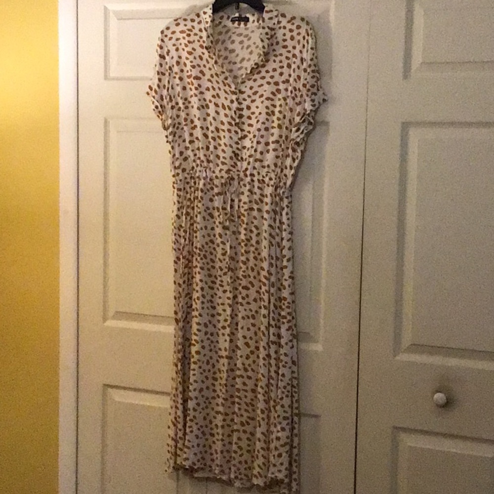 This is a midi dress with cinched waist size 12.